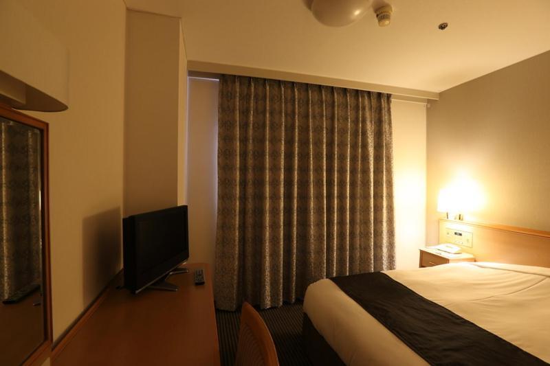 Shin Osaka Esaka Tokyu REI Hotel Suita Habitación foto