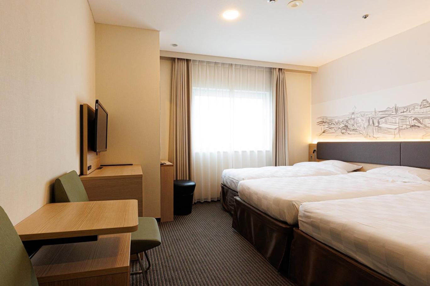 Shin Osaka Esaka Tokyu REI Hotel Suita Exterior foto