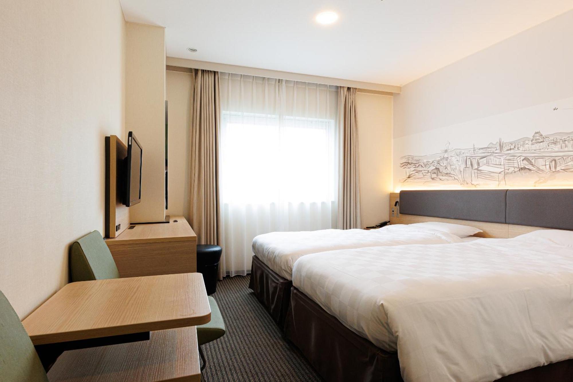 Shin Osaka Esaka Tokyu REI Hotel Suita Exterior foto