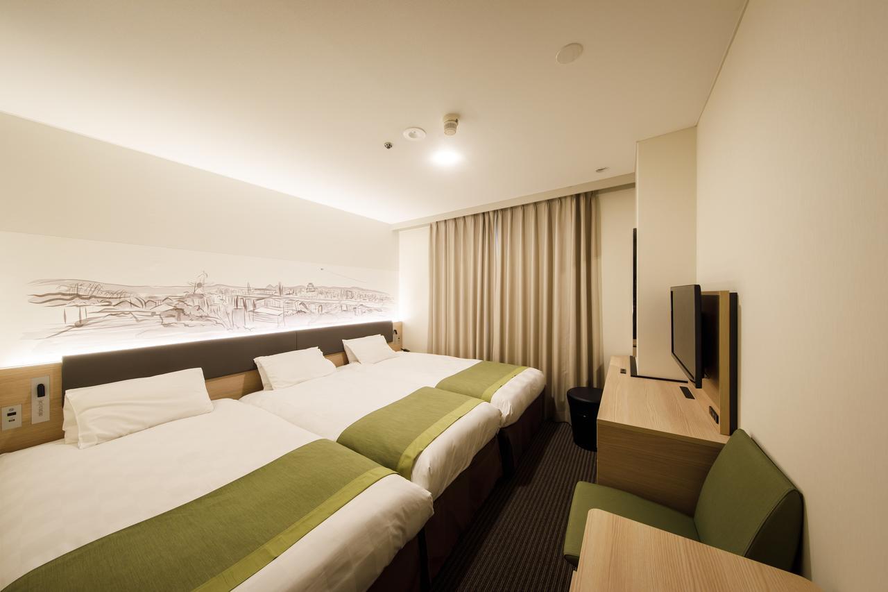 Shin Osaka Esaka Tokyu REI Hotel Suita Exterior foto