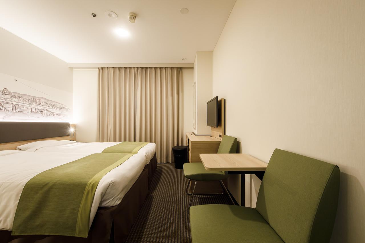 Shin Osaka Esaka Tokyu REI Hotel Suita Exterior foto